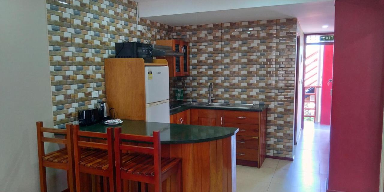 Al - Minhaj Service Apartments Нанди Экстерьер фото
