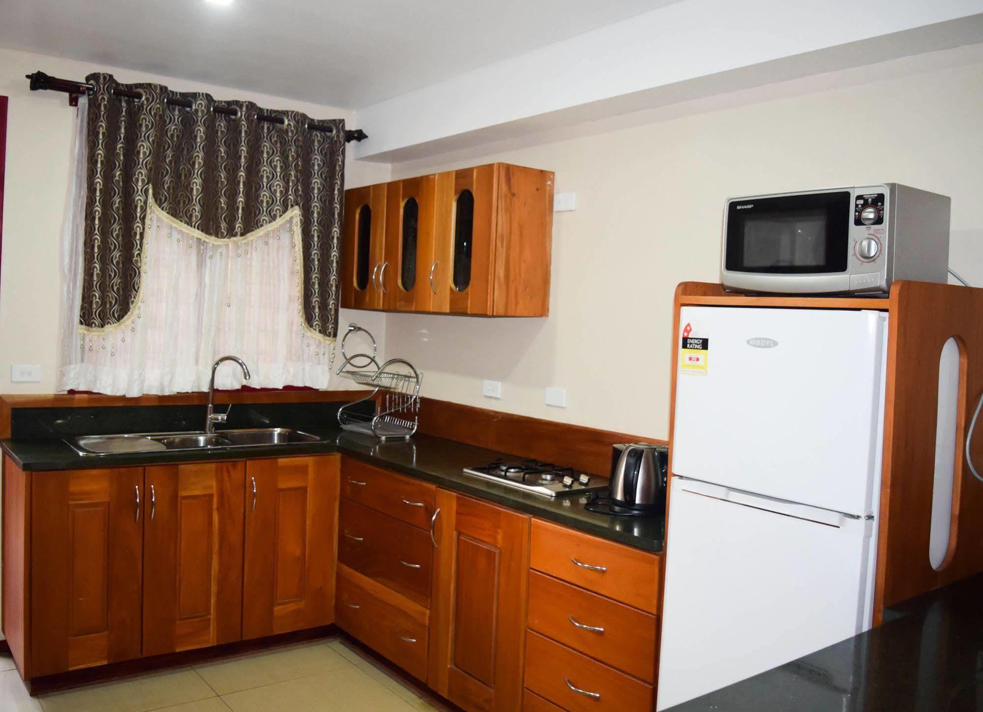 Al - Minhaj Service Apartments Нанди Экстерьер фото