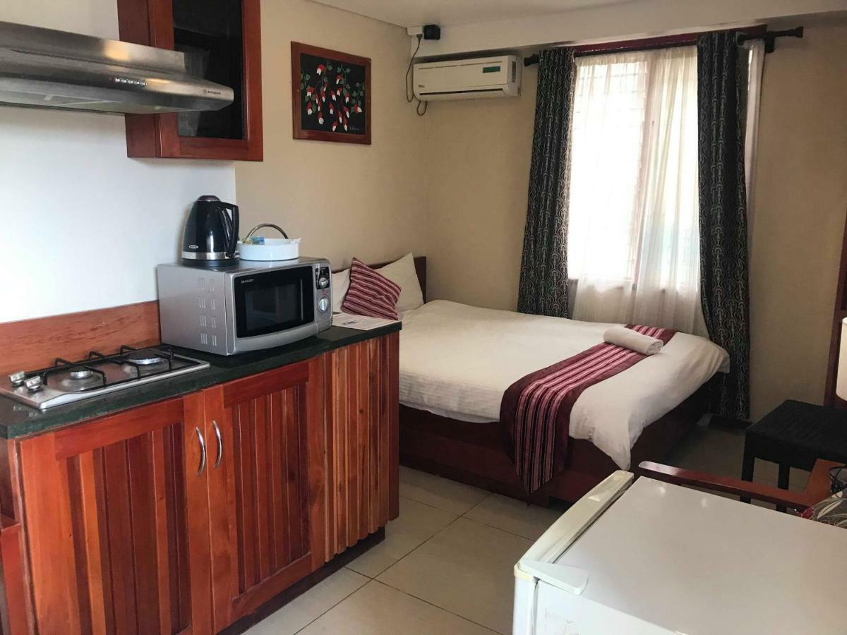 Al - Minhaj Service Apartments Нанди Экстерьер фото
